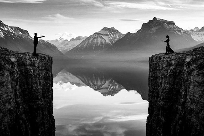 BnW Humans reaching in Landscape